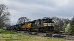 NS 1167 leads a long mixed freight train